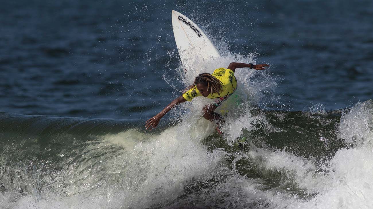Ras Tafari Lewis surfing in the Rip Curl GromSearch comp