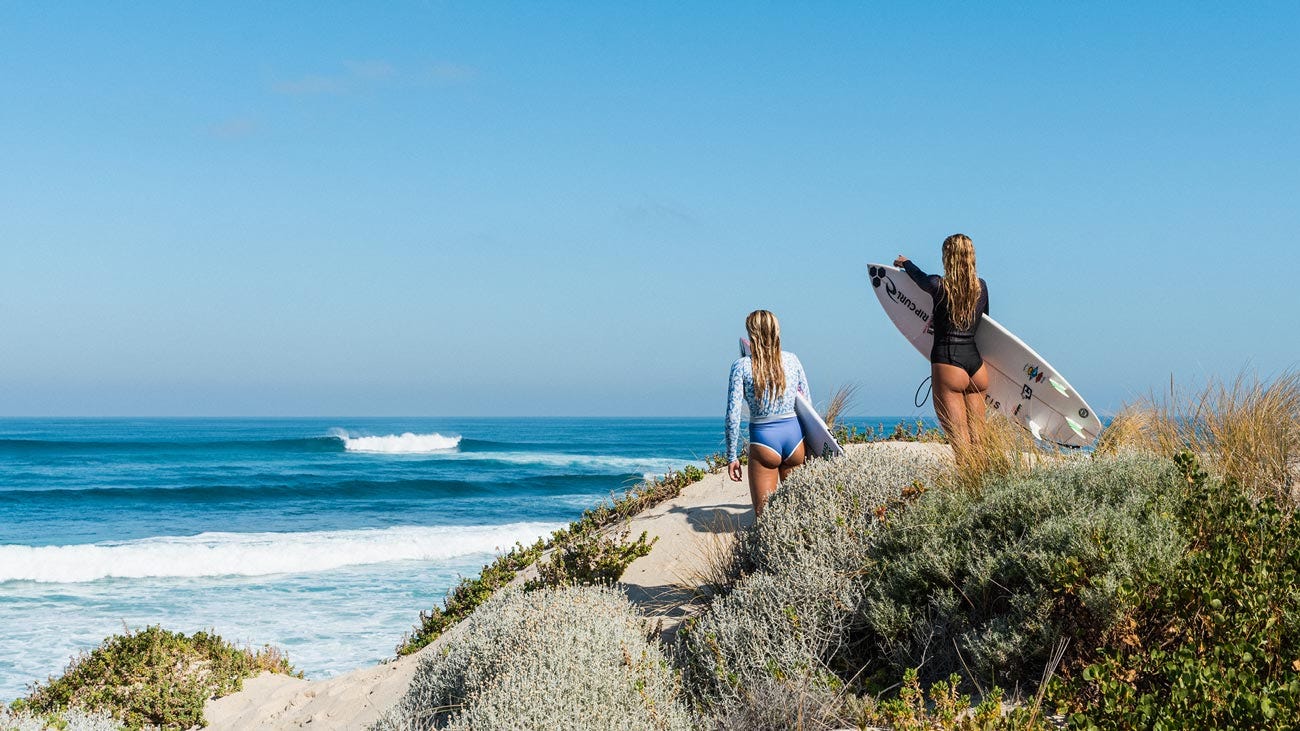 Two Rip Curl team riders checking the surf in Western Australia