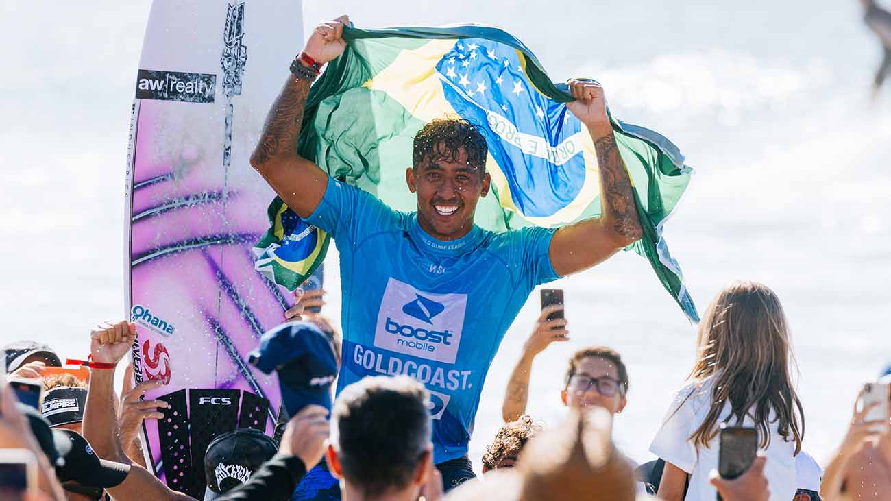 Sammy Pupo celebrating his win being chaired across the beach. 