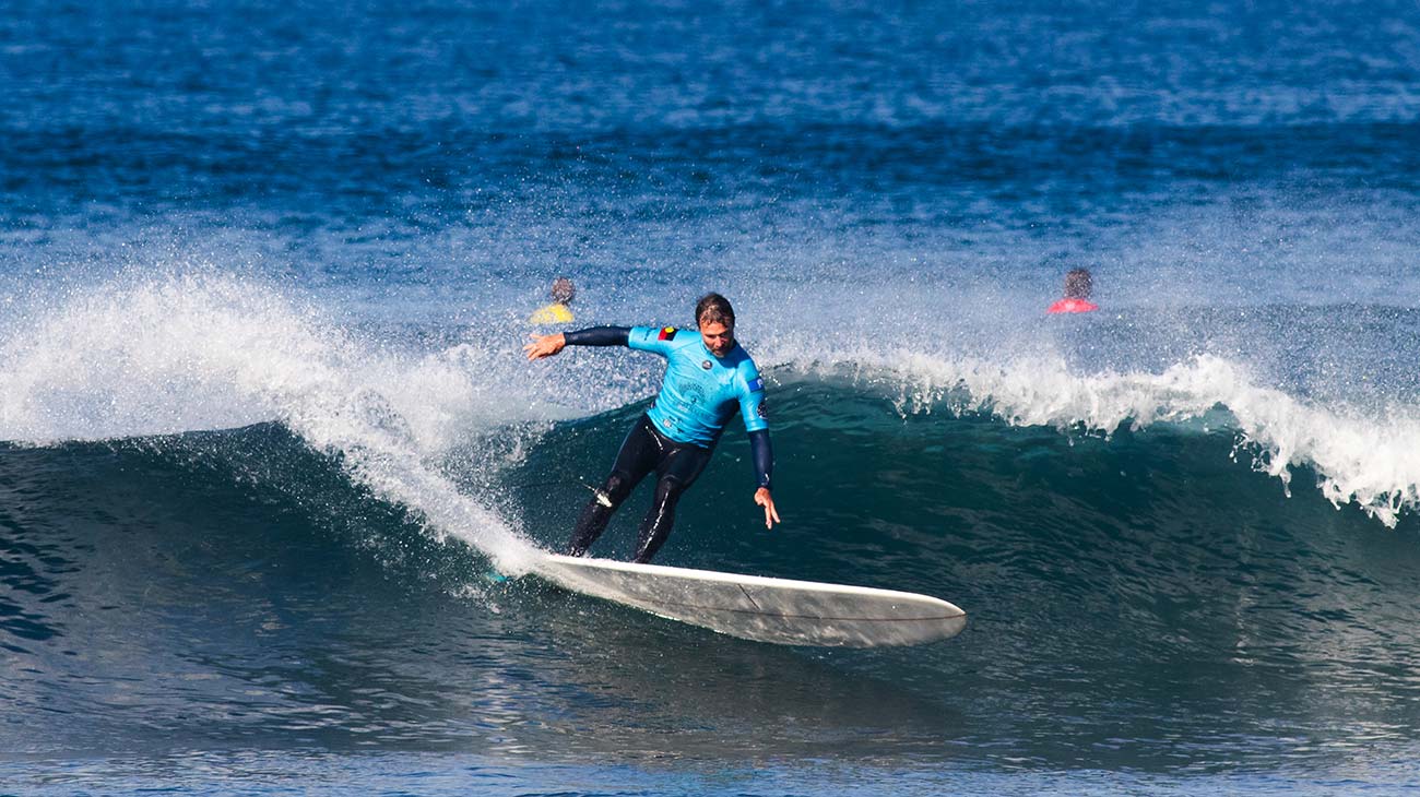 Contestant surfing in the Indigenous Surfing Titles
