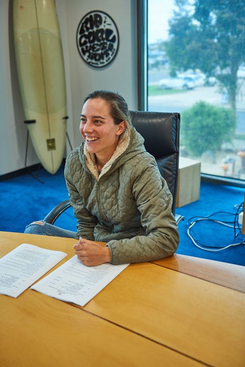 Tyler Wright signs her new contract with Rip Curl