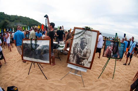 Framed images of Eddie Aikau at the opening ceremony