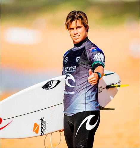 Morgan Cibilic and Gabriel Medina holding their trophies