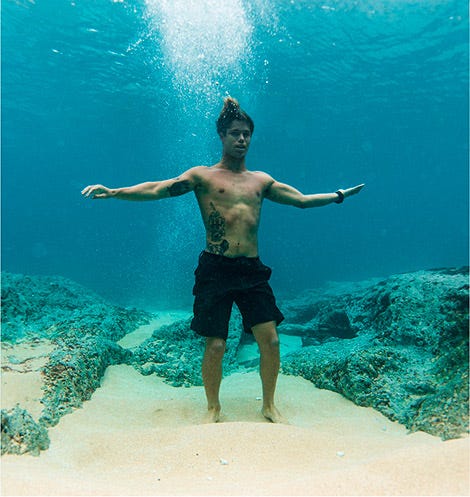 Morgan Cibilic standing up under water