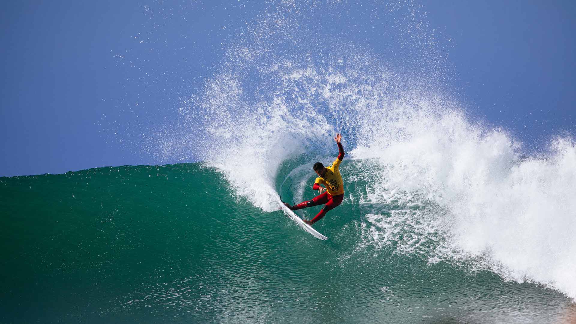 Filipe Toledo surfing in his heat