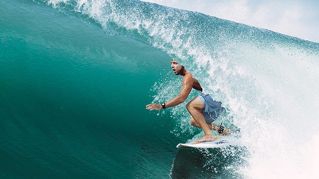 Mick Fanning getting barrelled wearing the Search GPS 2 Watch