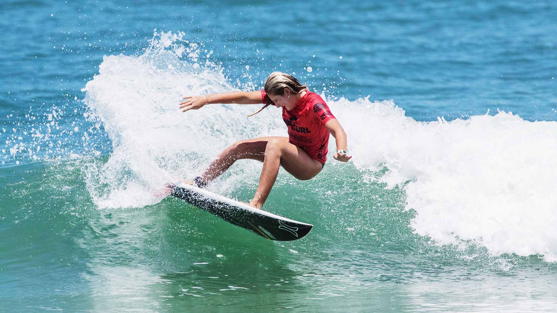 Kylie Pulcini surfing in her heat at the GromSearch event