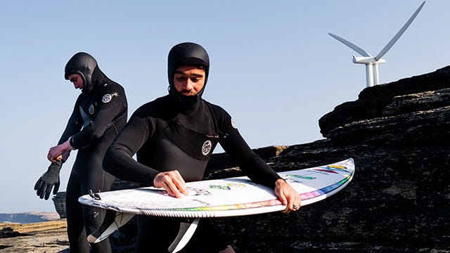 Mason Ho wears the HeatSeeker wetsuit hood in Scotland