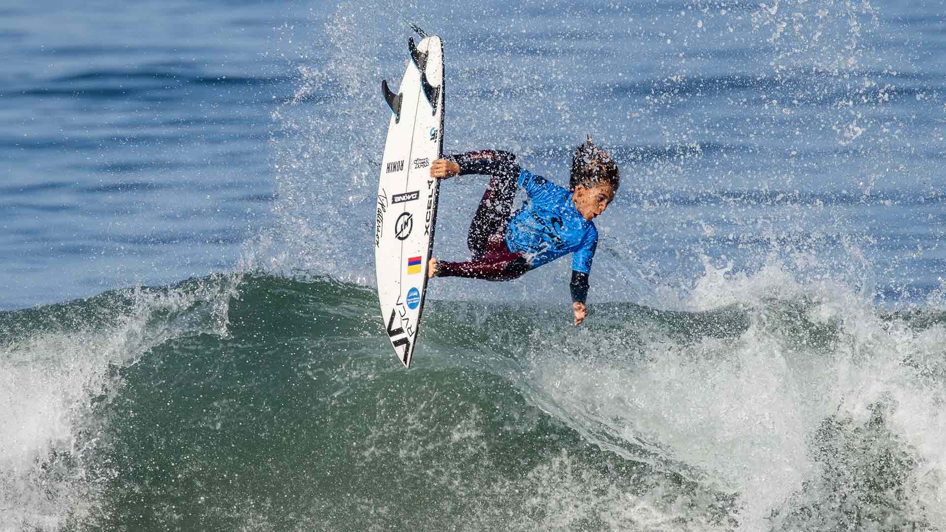 Kahlil Schooley surfing in their GromSearch heat