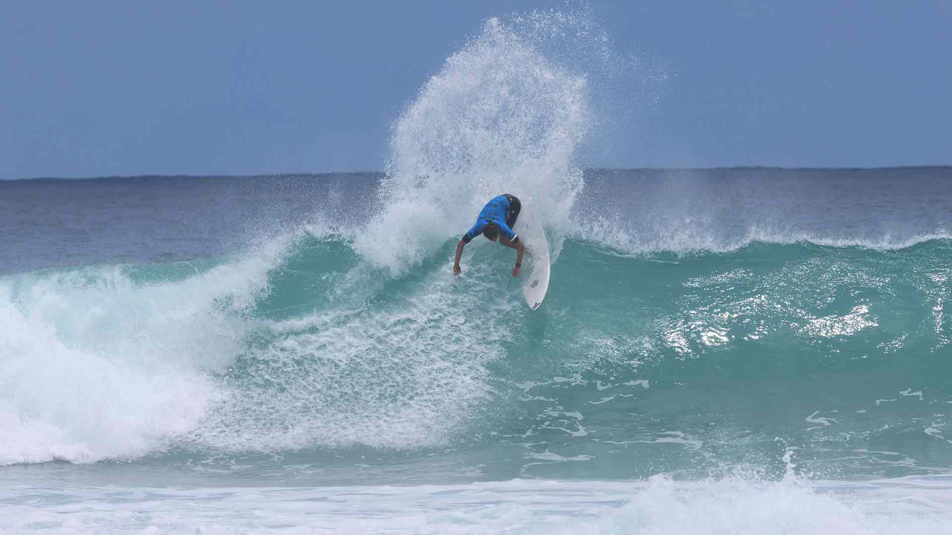 Luke Tema Lima surfing in their heat