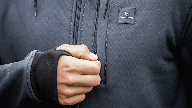 Close up image of the Anti-Series Soft Tech Fleece being zipped up