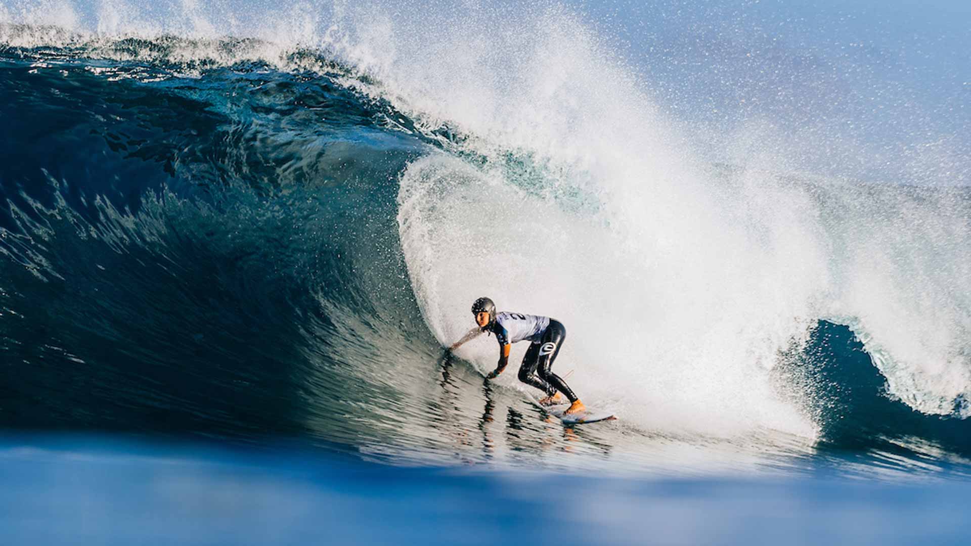 Molly Picklum Surfing Pipeline