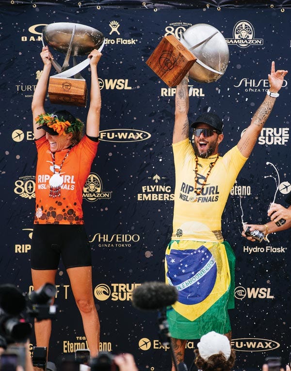 Stephanie Gilmore holding up the WSL Finals trophy