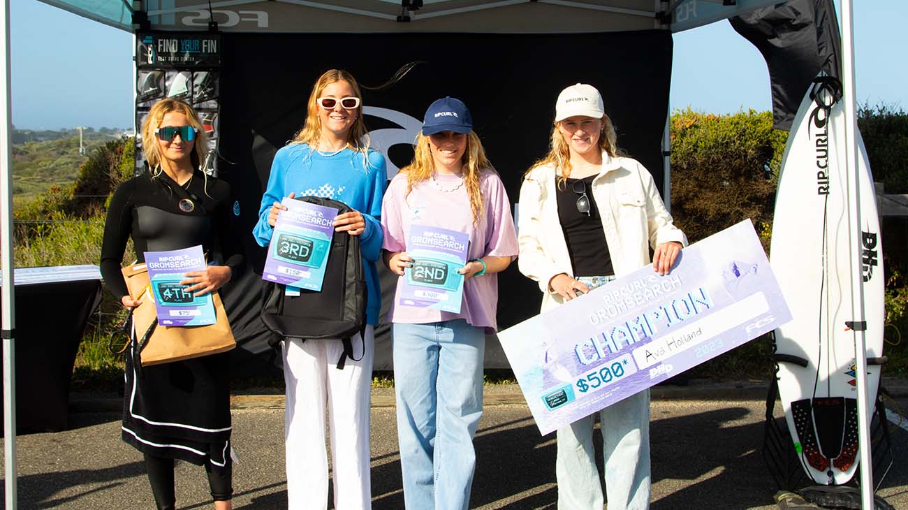 Group shot of the under 16 girls with their prize packs