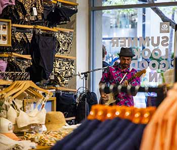 Musicians play at the opening of the Rip Curl store in Waikiki