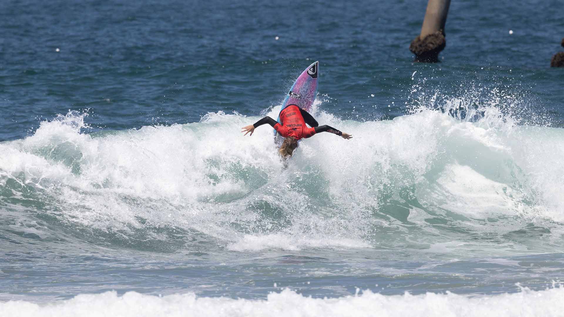 Will Deane surfing in his GromSearch heat